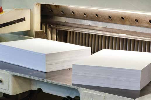 Stacked cut paper sheets